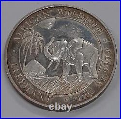 2017 Somalia 100 Shillings 1 Oz. 999 Silver Coin-Elephants Lite Handling/Toned